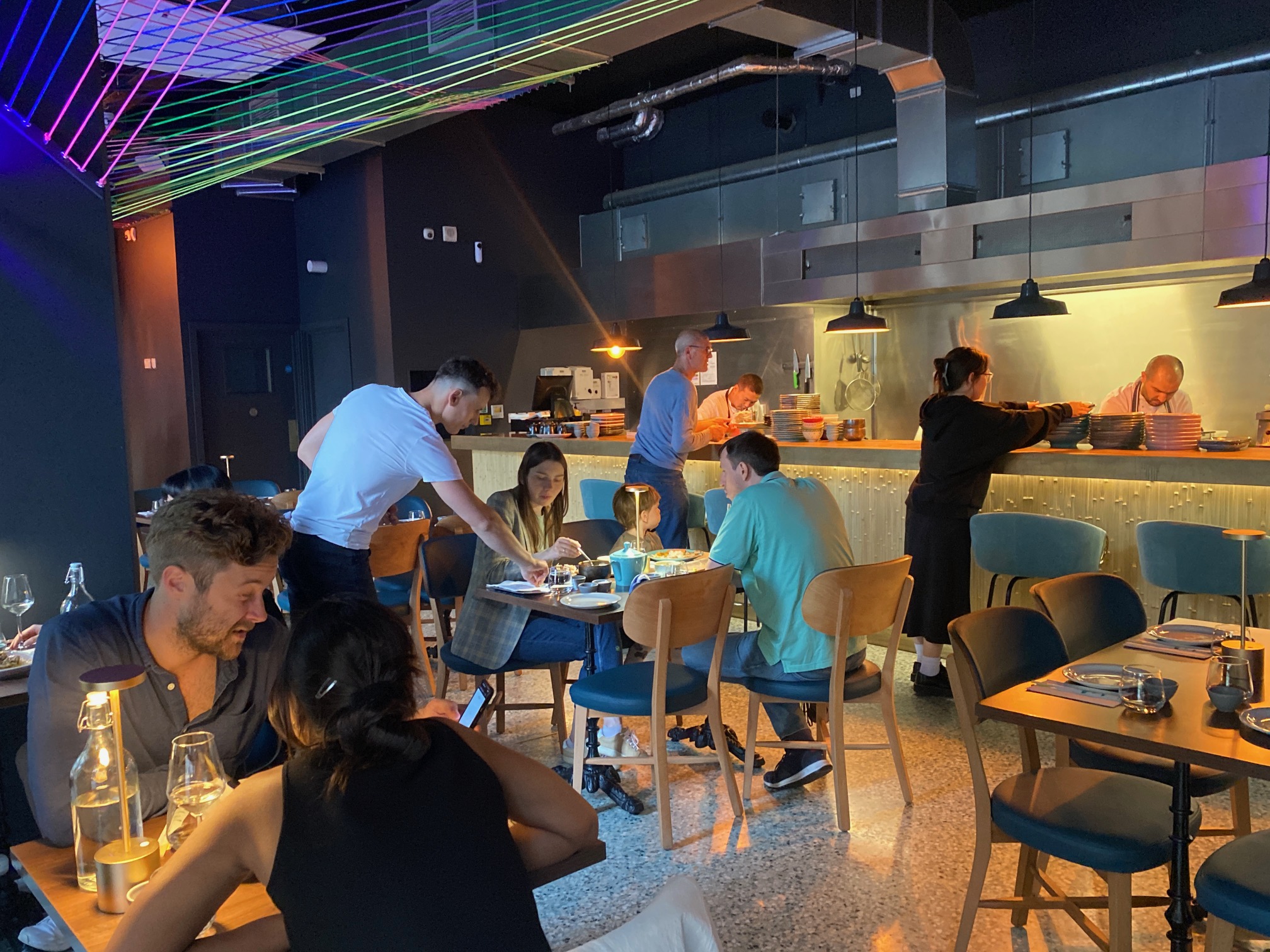 Vibrant restaurant dining space with modern decor, perfect for social events and gatherings.