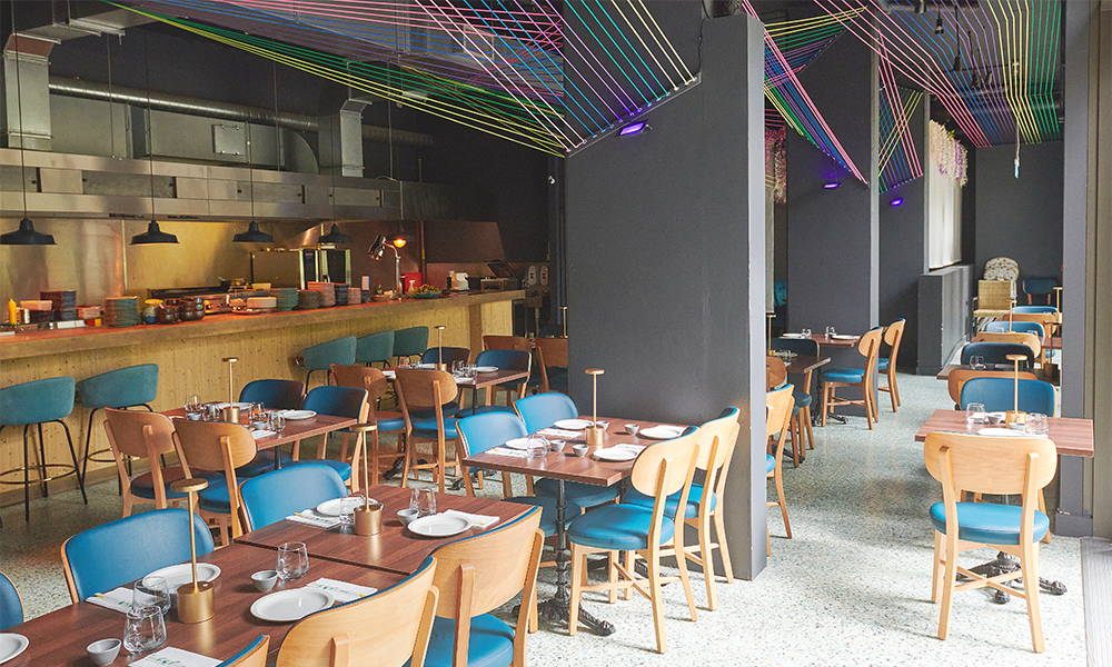 Vibrant bamboo mat restaurant with modern decor for meetings and events.