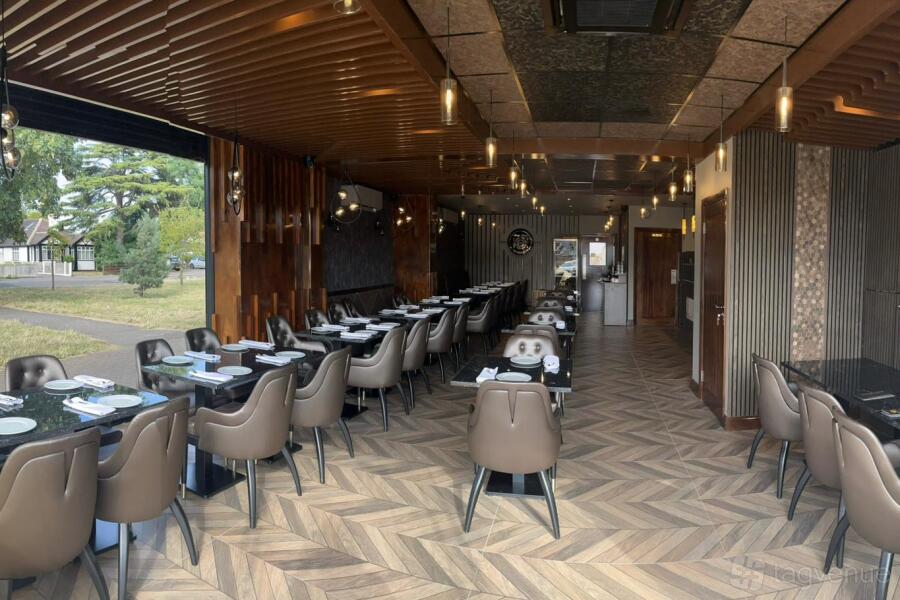 Modern restaurant interior with polished floors, ideal for corporate and social events.