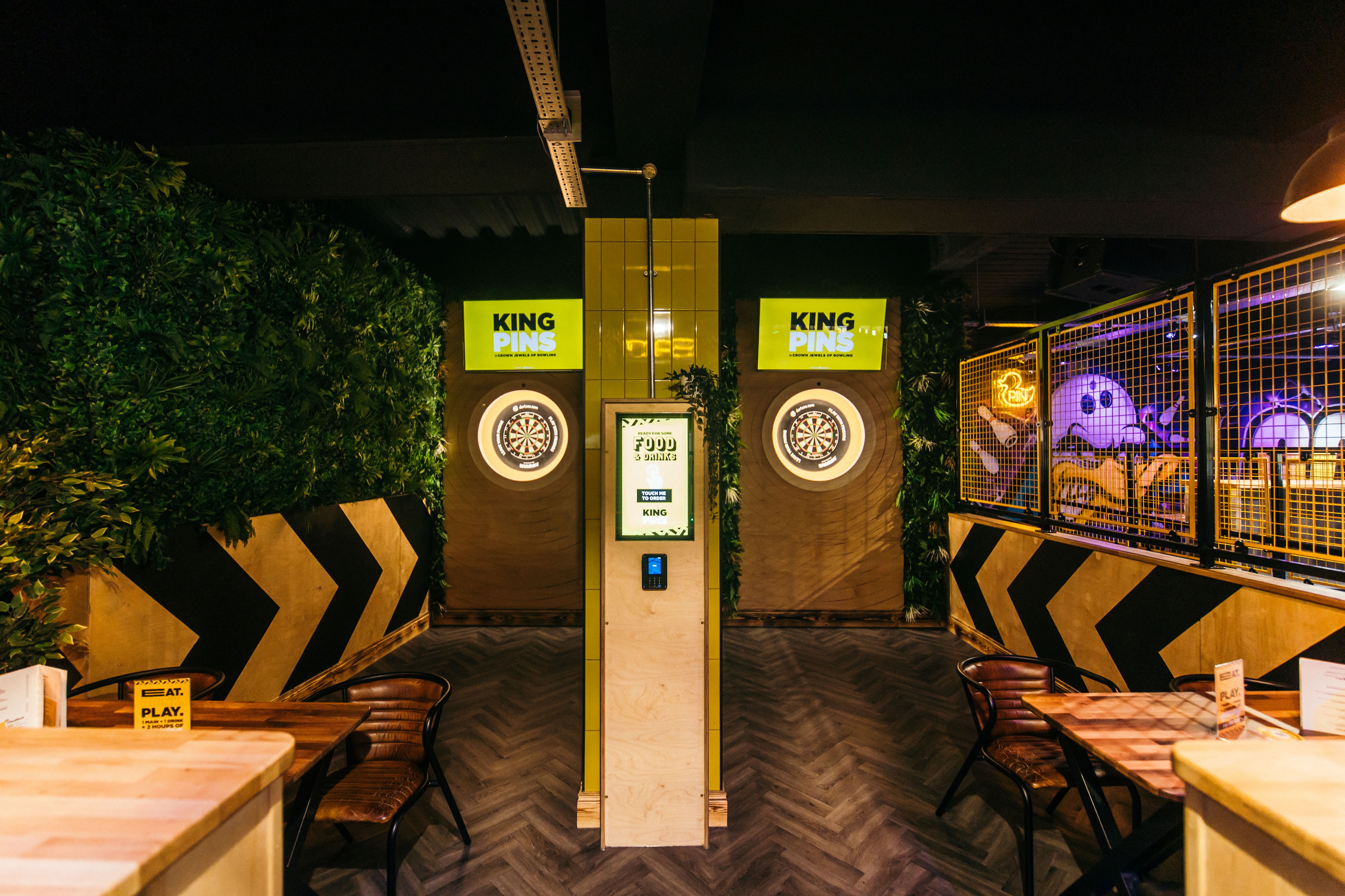 Modern event space in The Bullseye Zone, Belfast with vibrant decor for casual gatherings.