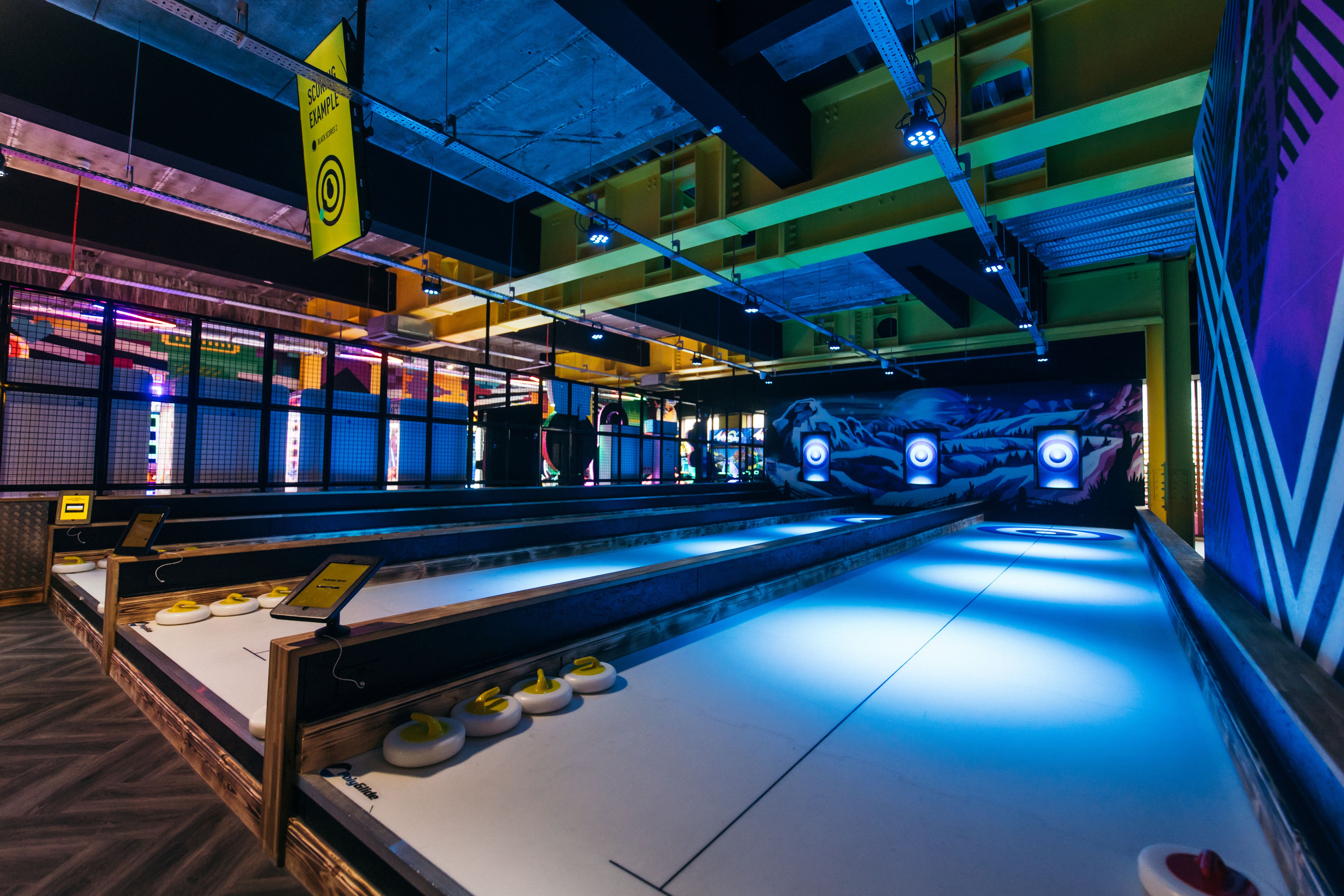 Vibrant event space with sleek lanes for corporate gatherings in Belfast's Glide Zone.