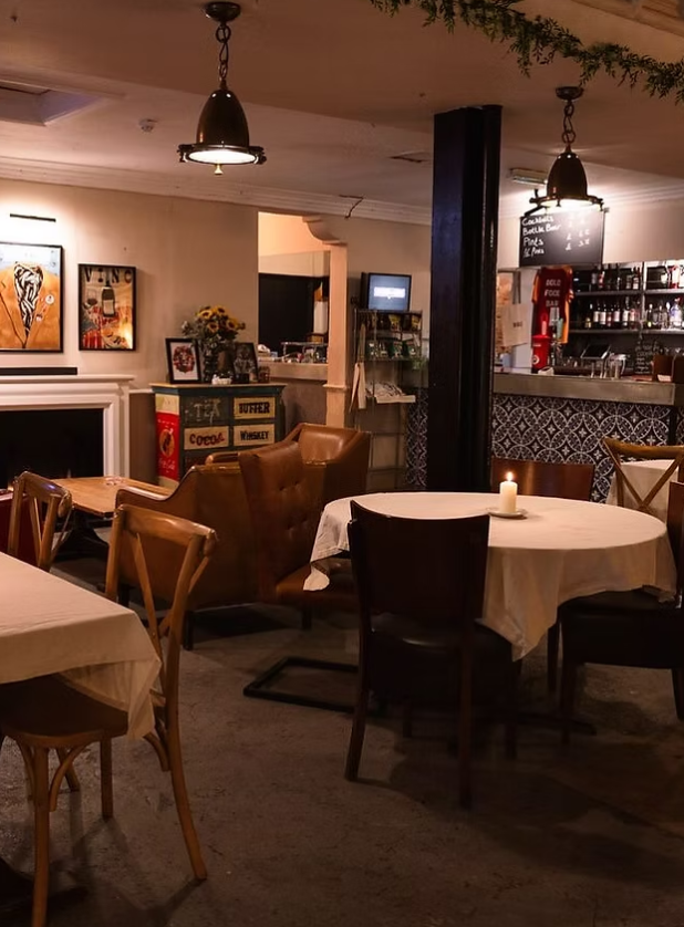Cozy Bold Food & Bar venue with ambient lighting for intimate meetings and events.