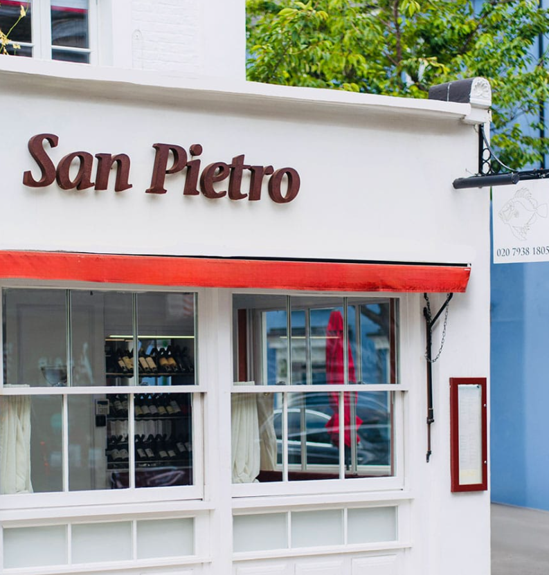 Charming San Pietro restaurant in London, perfect for intimate dining and wine tastings.