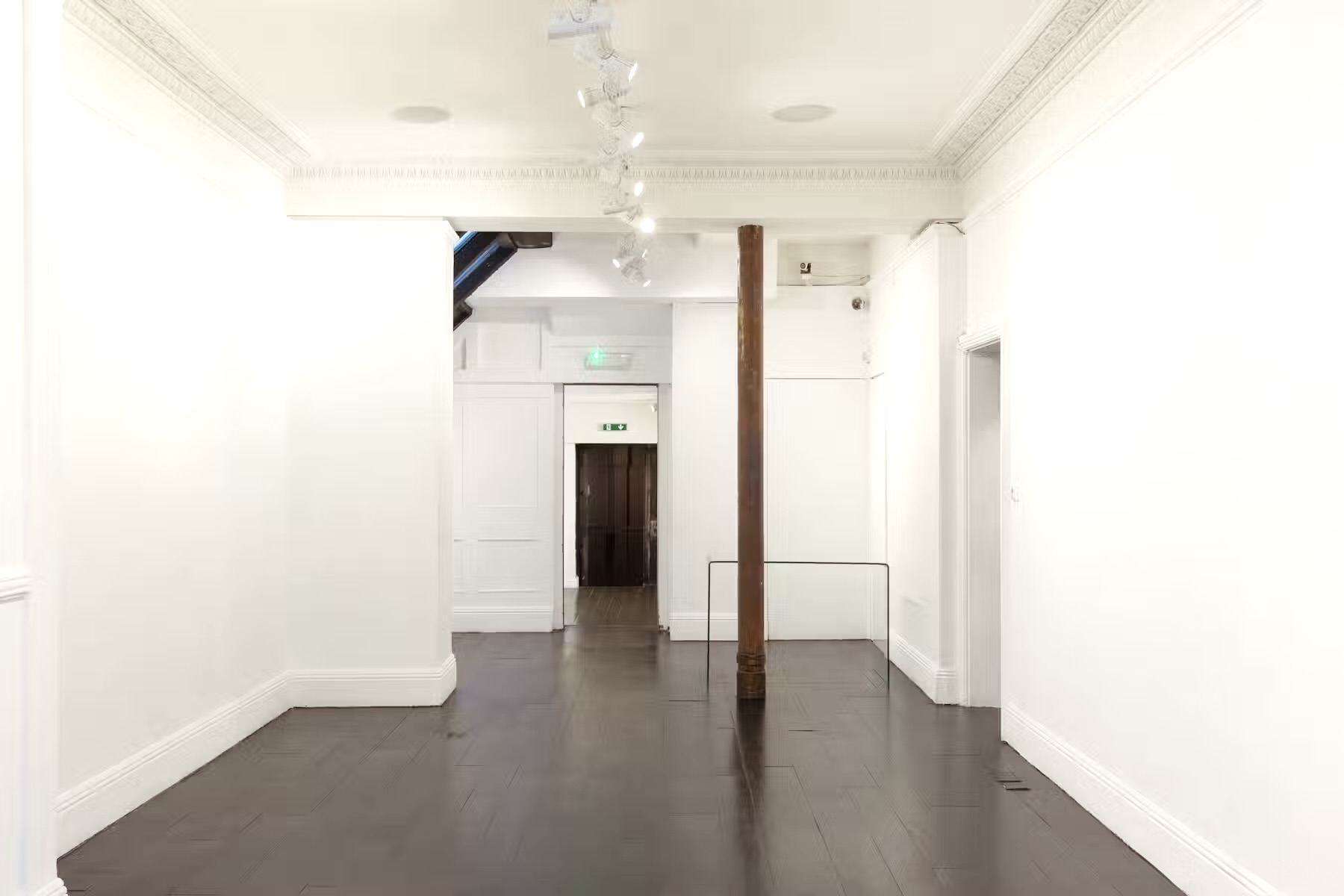 Versatile minimalist event space at 15 Bateman Street, ideal for corporate meetings and exhibitions.