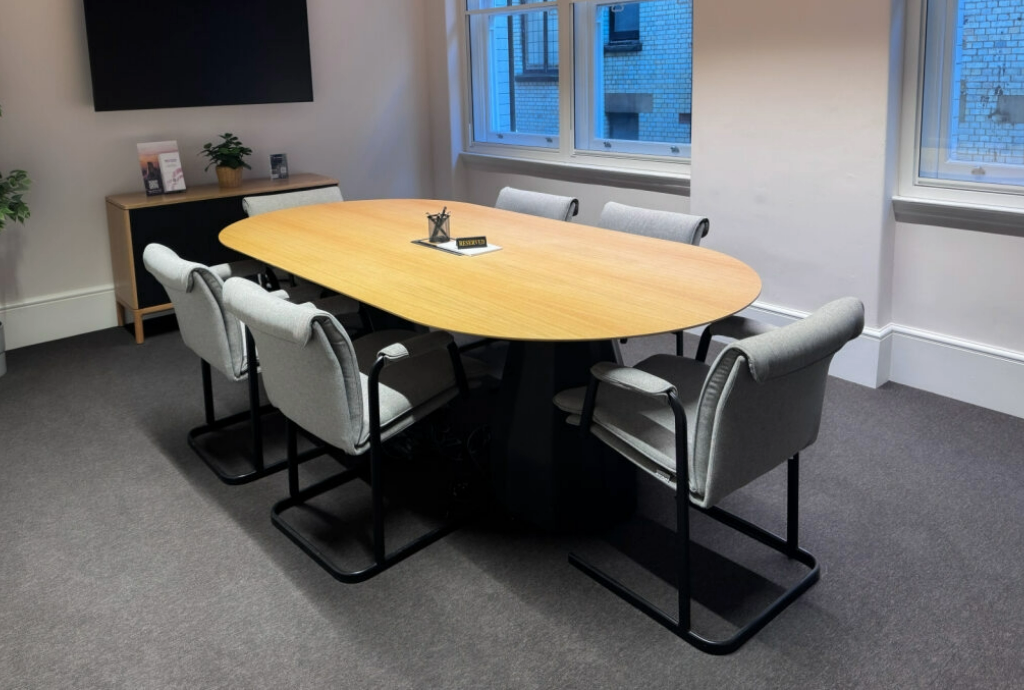 Modern meeting room with oval table and ergonomic chairs in Cavendish MYCO.