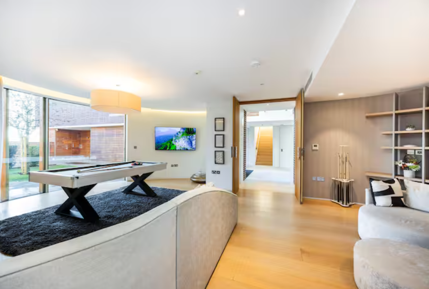 Modern meeting space in Radlett Eco Mansion, ideal for gatherings and brainstorming sessions.