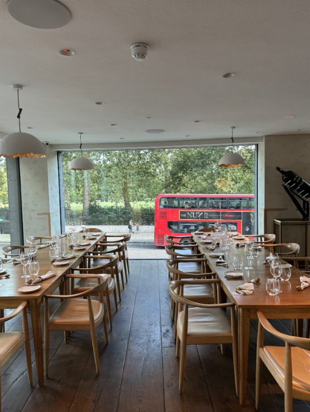 Elegant dining room with city view, ideal for corporate meetings and upscale events.