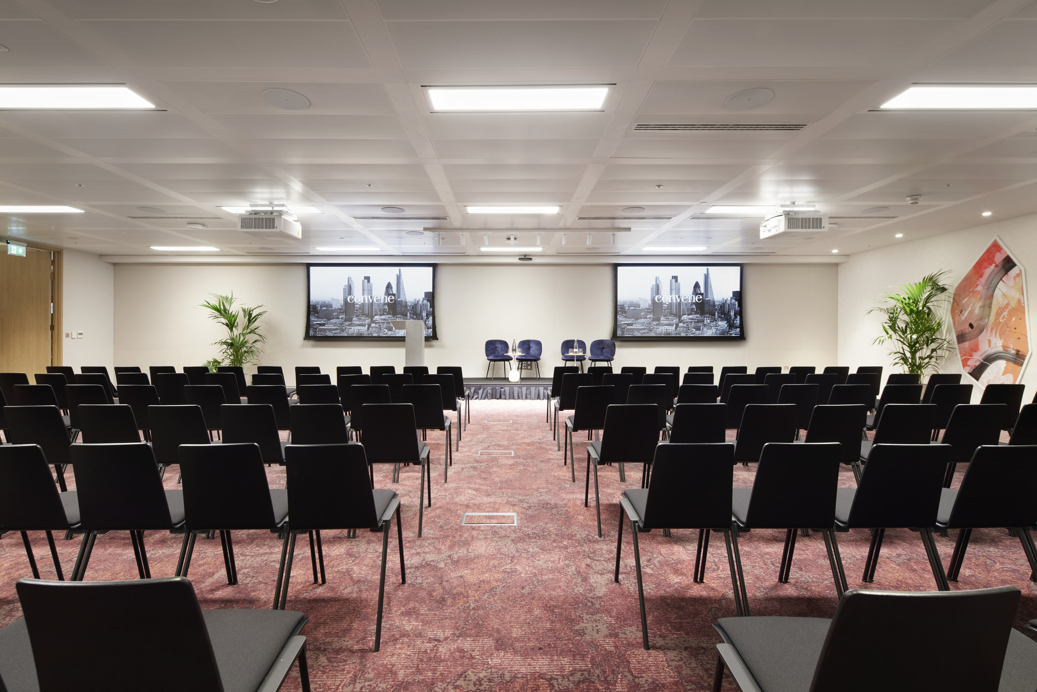 Bon Hub conference room with sleek black chairs for presentations and networking events.