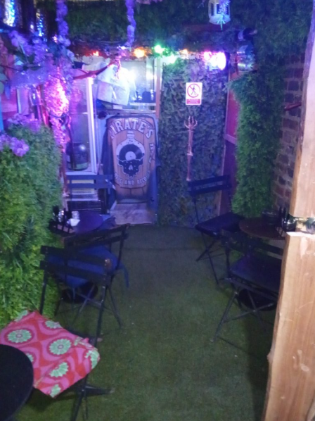 Pirate-themed event venue with rustic decor, ideal for casual gatherings and networking.