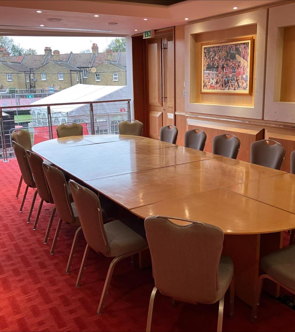 Boardroom at Charlton Athletic with oval table, ideal for meetings and events.