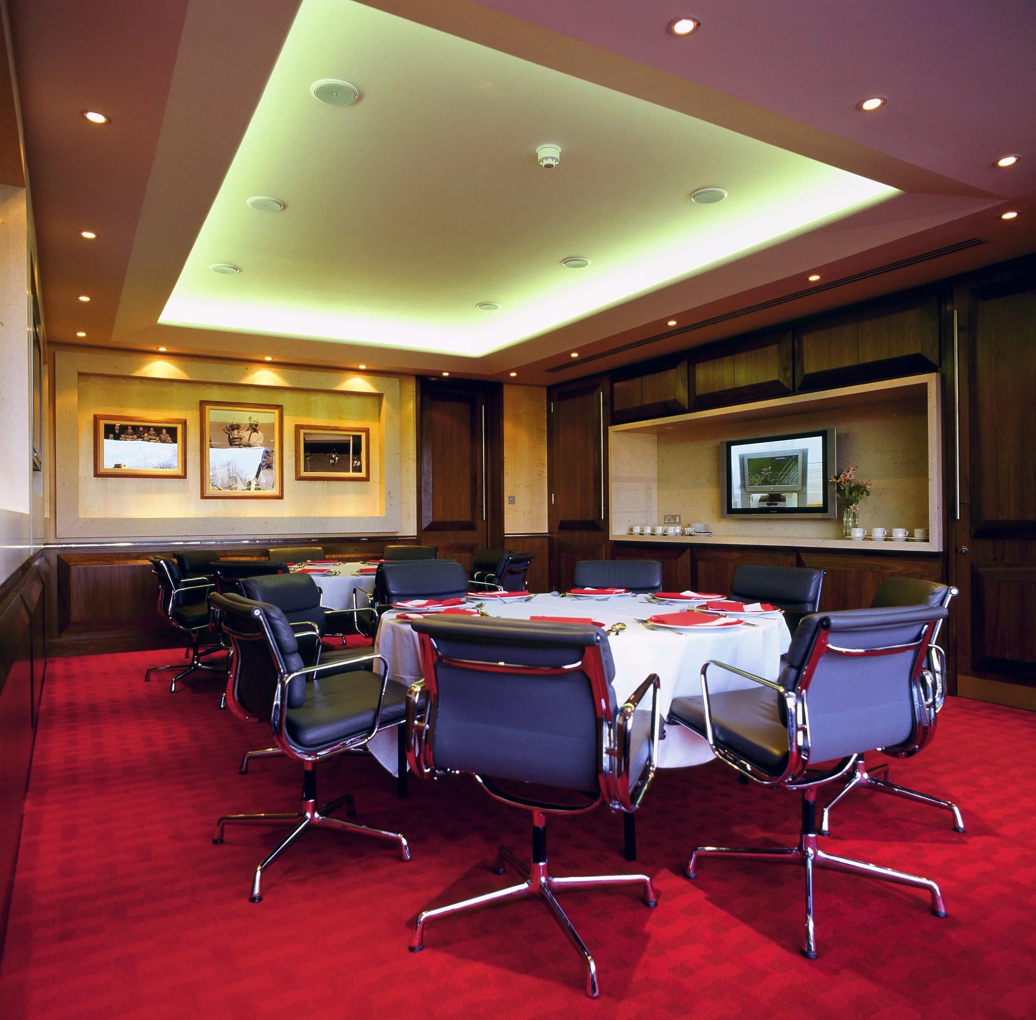 Boardroom at Charlton Athletic with round table, ideal for meetings and events.