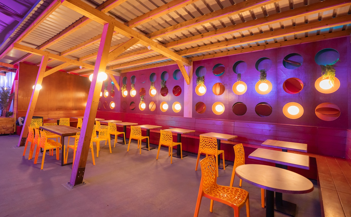 Vibrant meeting space with colorful seating for creative events in Brixton.