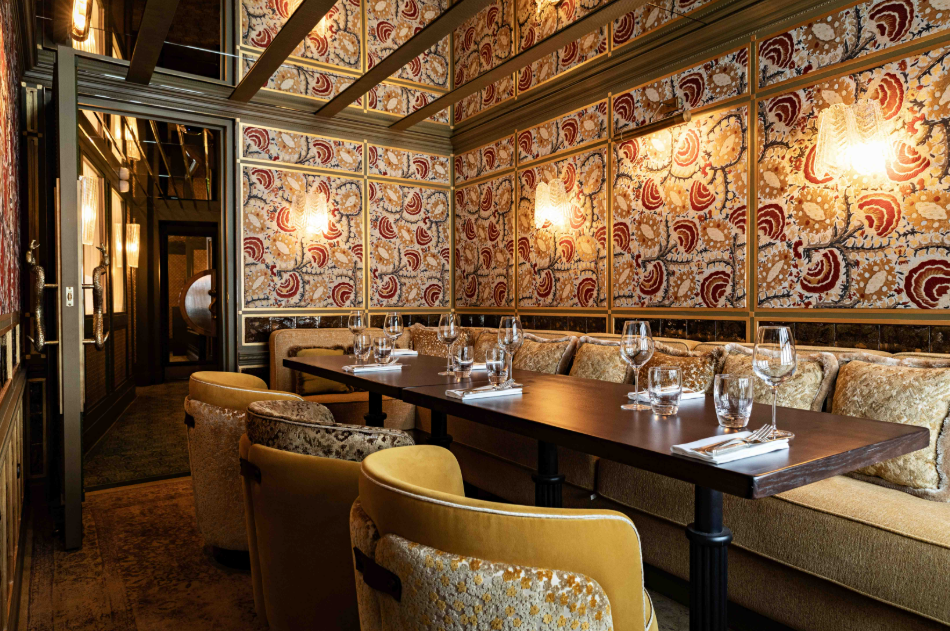 Intimate upscale dining space with plush seating for private events at Salon Gaillon.