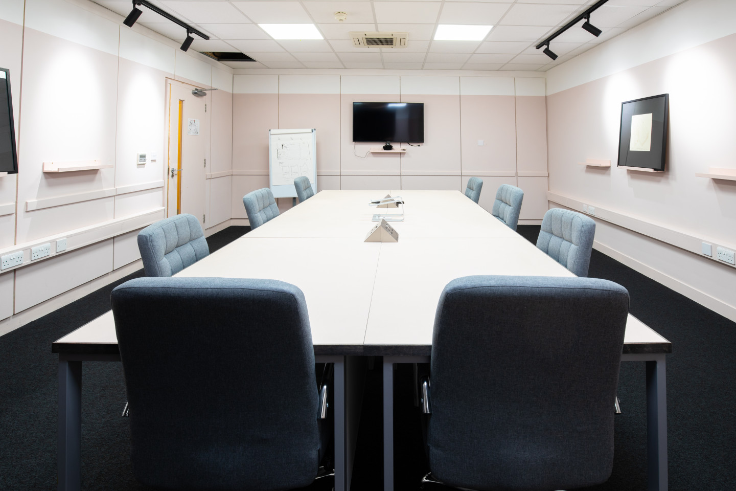 Salisbury Room at The Building Centre: modern meeting space with high-res screen and seating