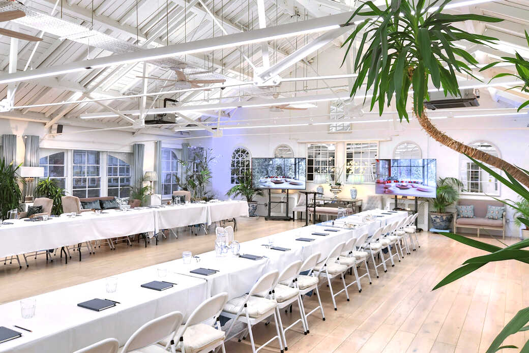 Event space at 47/49 Tanner Street with long tables, ideal for meetings or conferences.