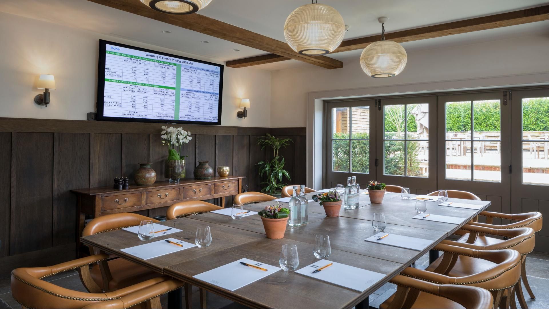 Private Meeting Room 2 at Hurley House Hotel with wooden table, perfect for corporate events.