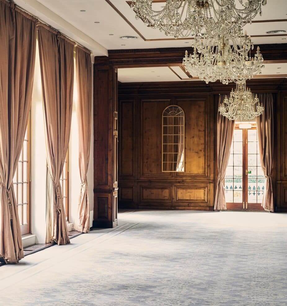Hedsor House ballroom with wood paneling for luxury corporate events and upscale meetings.
