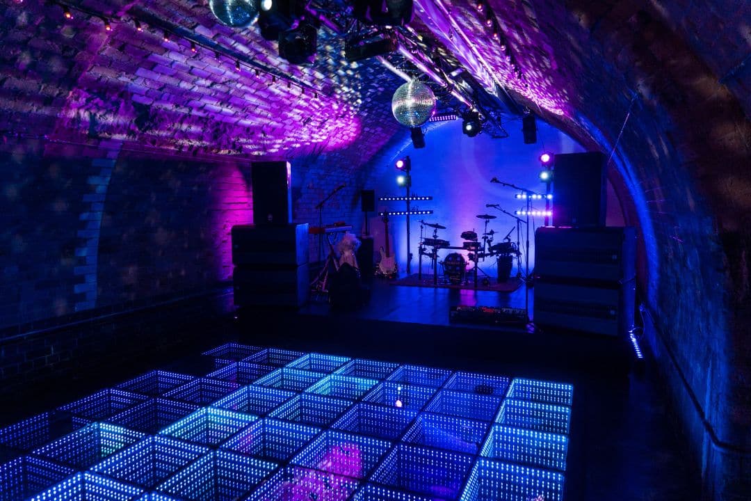 Vibrant Kachette venue with stylish setup, ideal for concerts and corporate events.