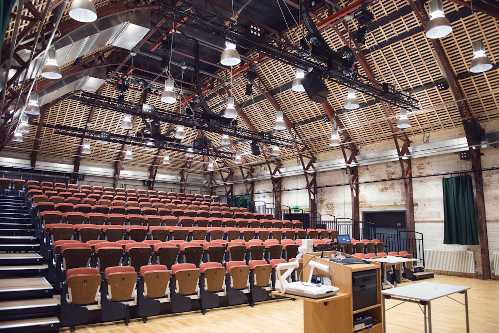 Auditorium setup in Boiler House with tiered seating for presentations and lectures.