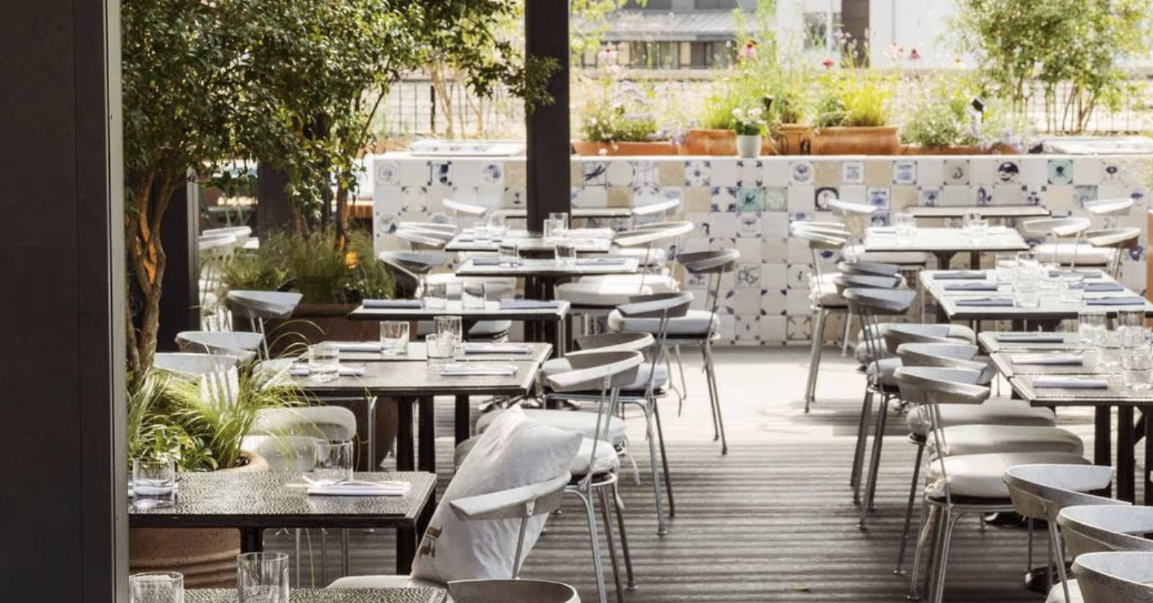 Outdoor dining space at The Conduit, ideal for networking events and casual meetings.