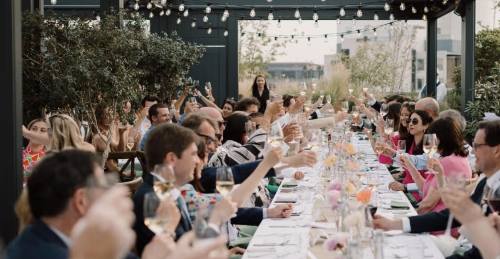 Vibrant outdoor dining setup at The Conduit for weddings and corporate events.