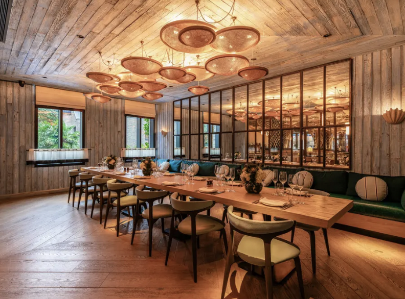 Amalfi Glass Dining Room with elegant decor, perfect for intimate gatherings and events.