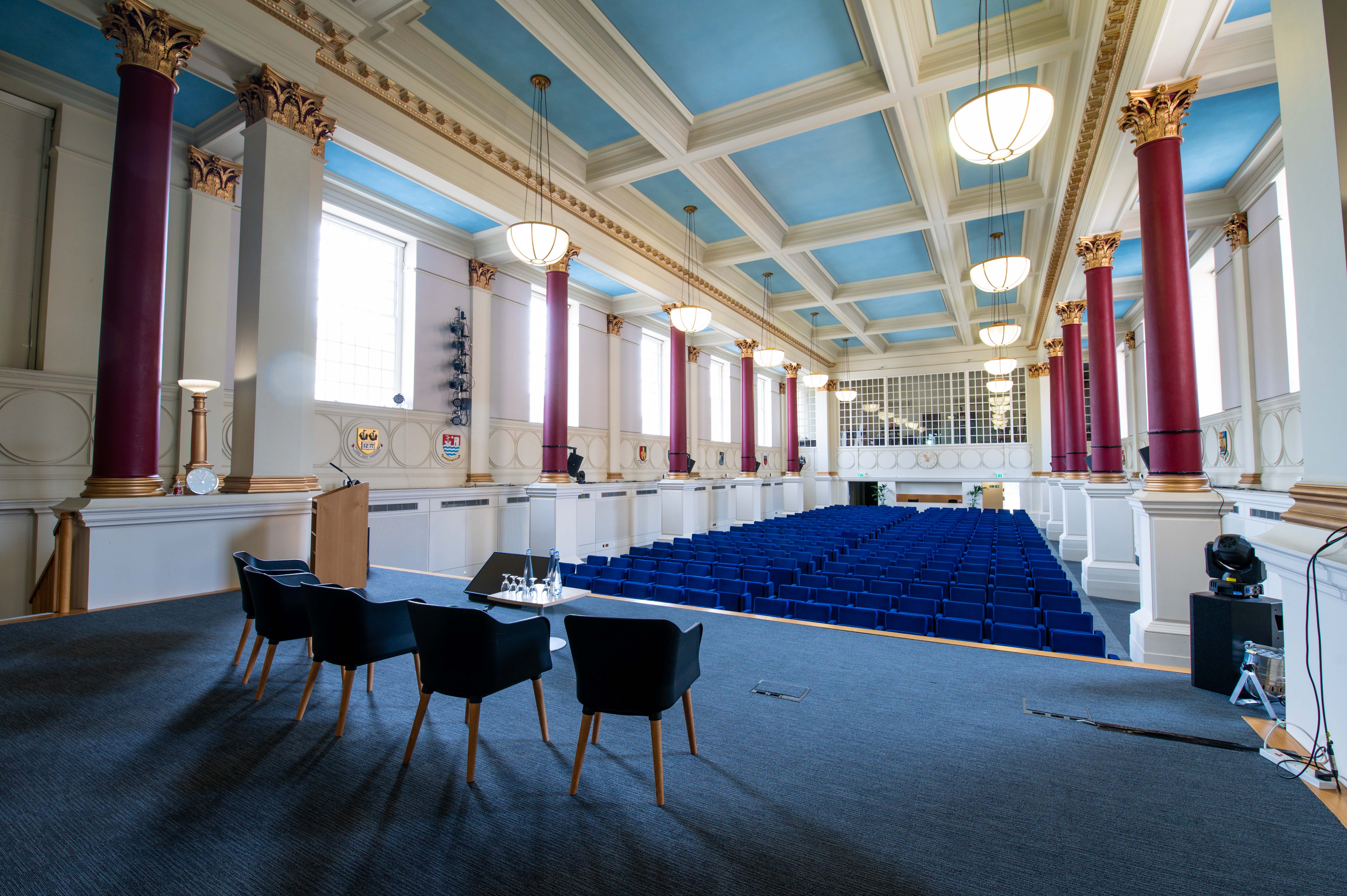Spacious auditorium with speaker podium for conferences and formal events at BMA House.
