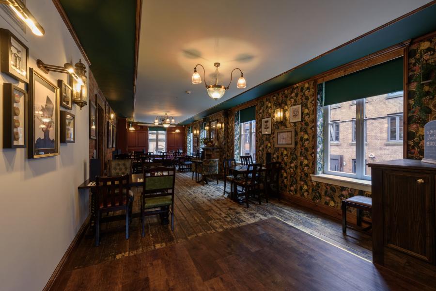 Cozy Downstairs Function Room at The Wayfarer, perfect for intimate gatherings and workshops.