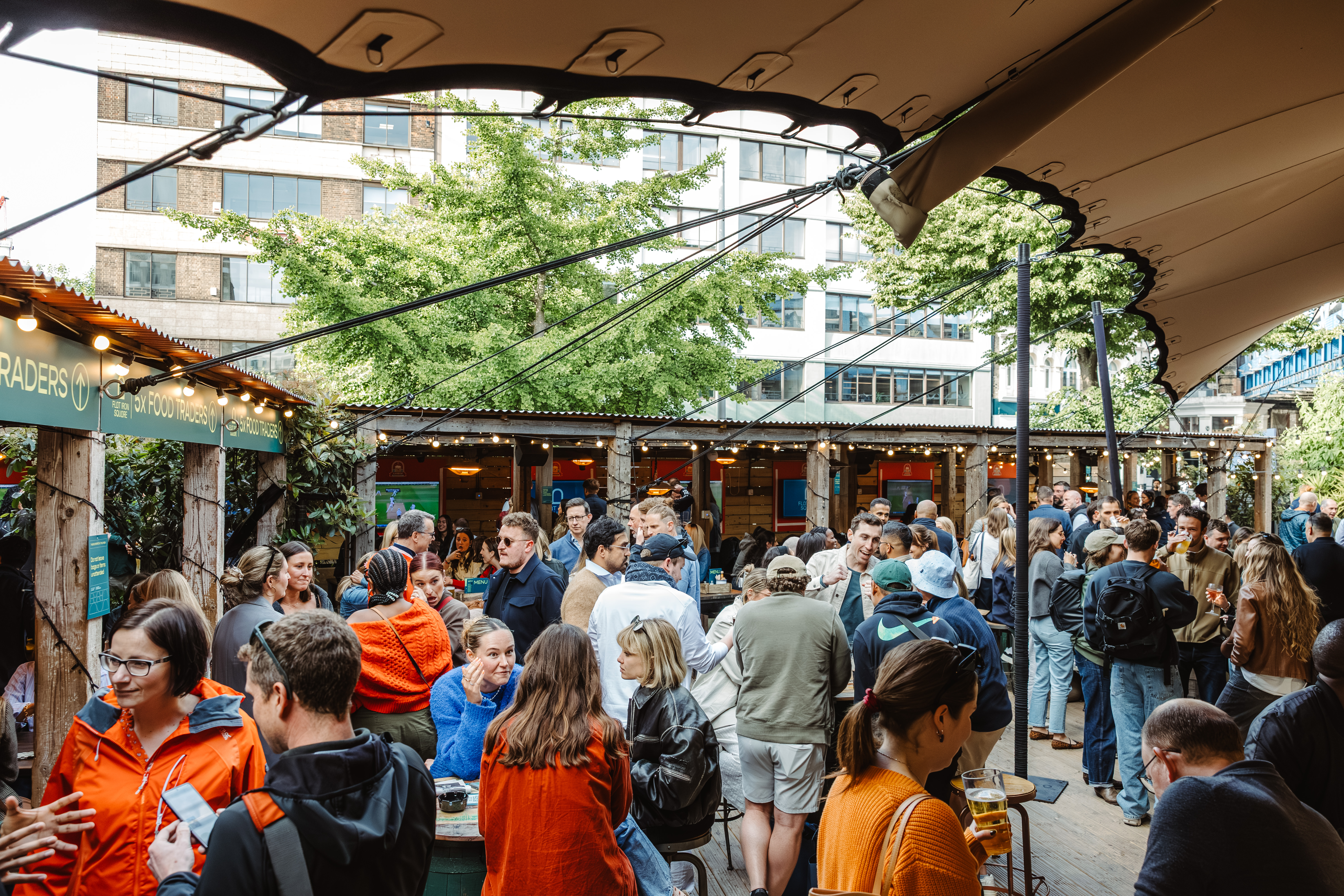 Lively outdoor event space at Flat Iron Square, ideal for networking and social gatherings.