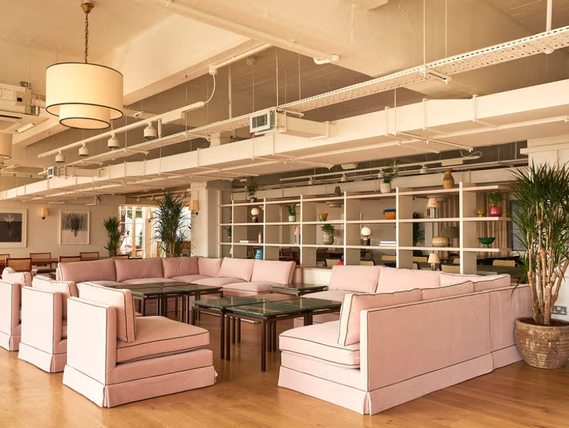 Modern lounge in Shoreditch Lofts, ideal for networking and informal meetings.
