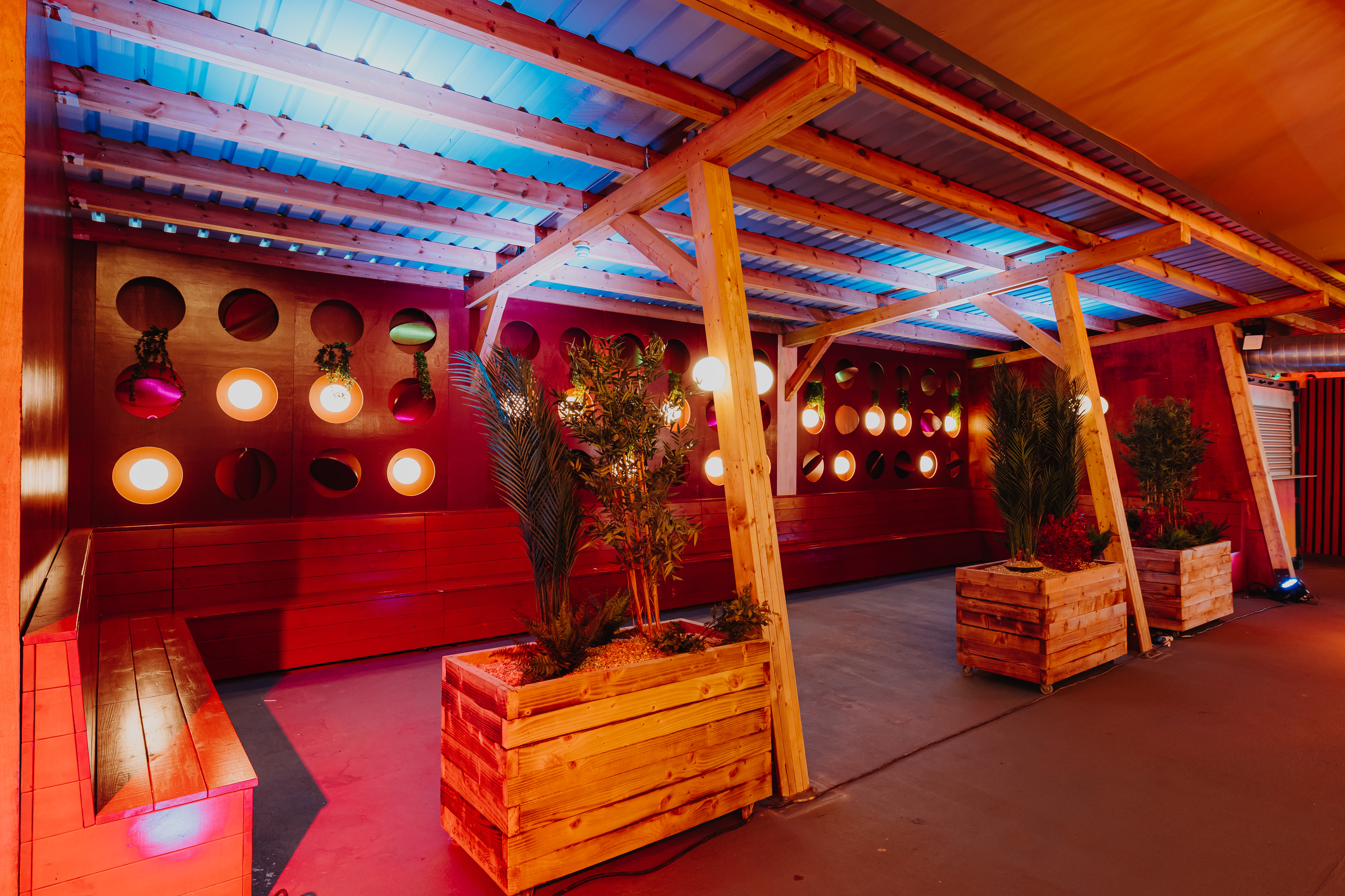 Yellow Zone breakout lounge with tiered seating for corporate events and brand activations.