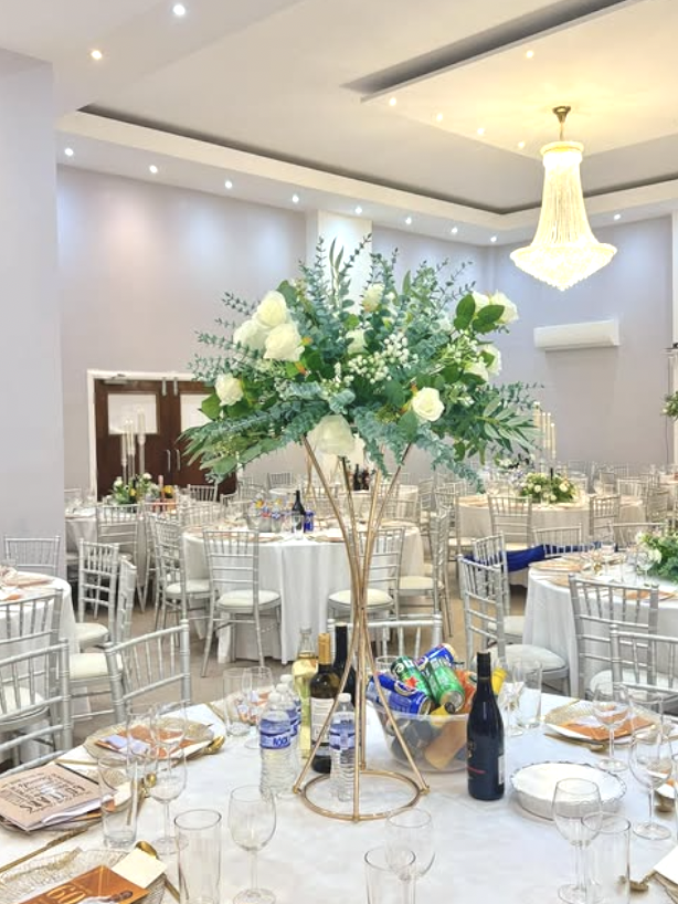 Elegant banquet hall, floral decor, wedding, event venue