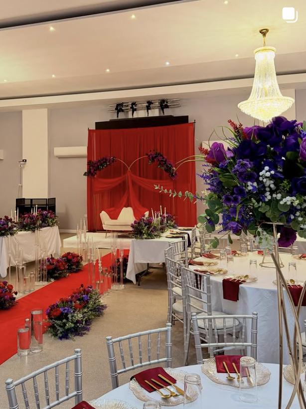 Wedding venue red floral decor