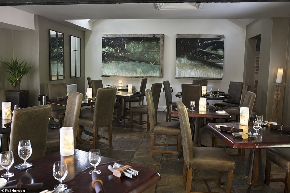 Main Restaurant at Sat Bains: stylish dining space for corporate dinners and intimate events.