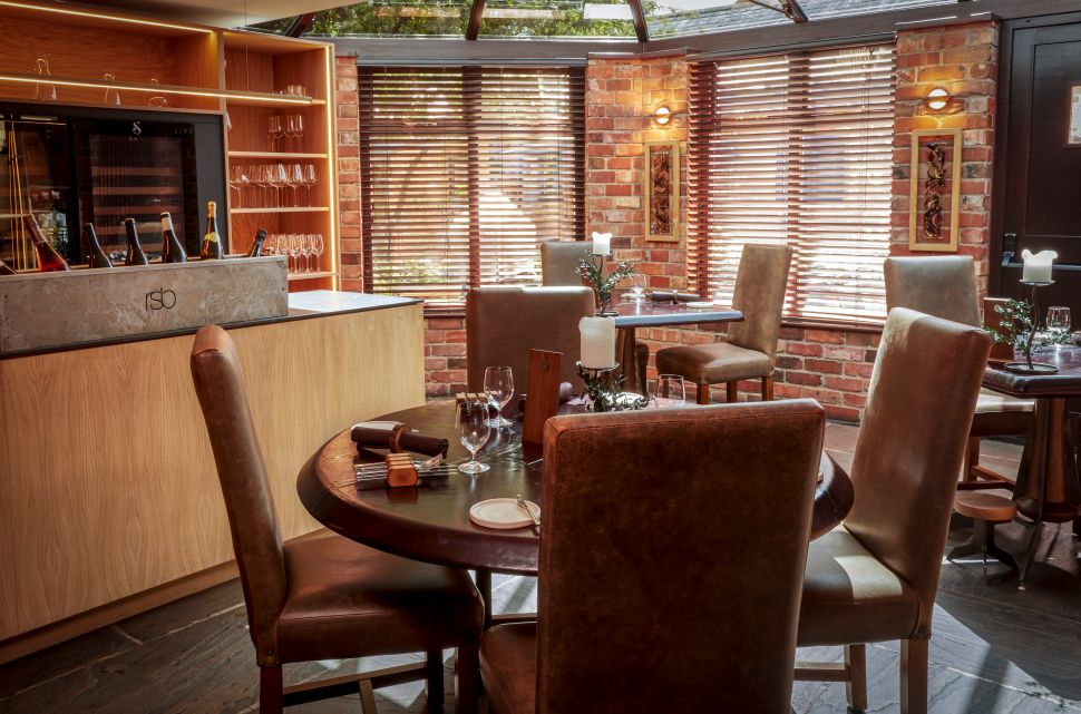 Intimate dining area at Restaurant Sat Bains, perfect for private events and networking.