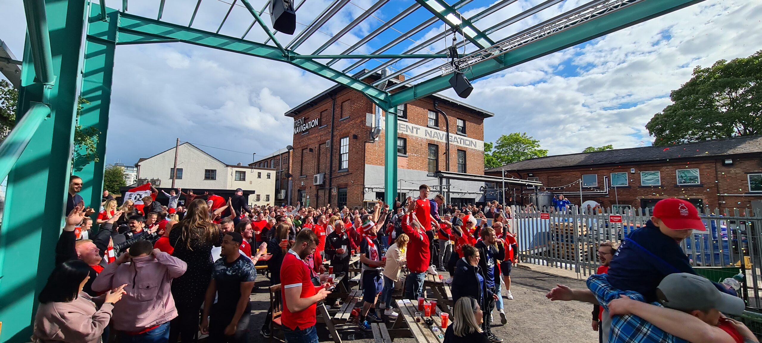 Vibrant outdoor event at The Big Shed in Ye Olde Trip to Jerusalem, perfect for gatherings.