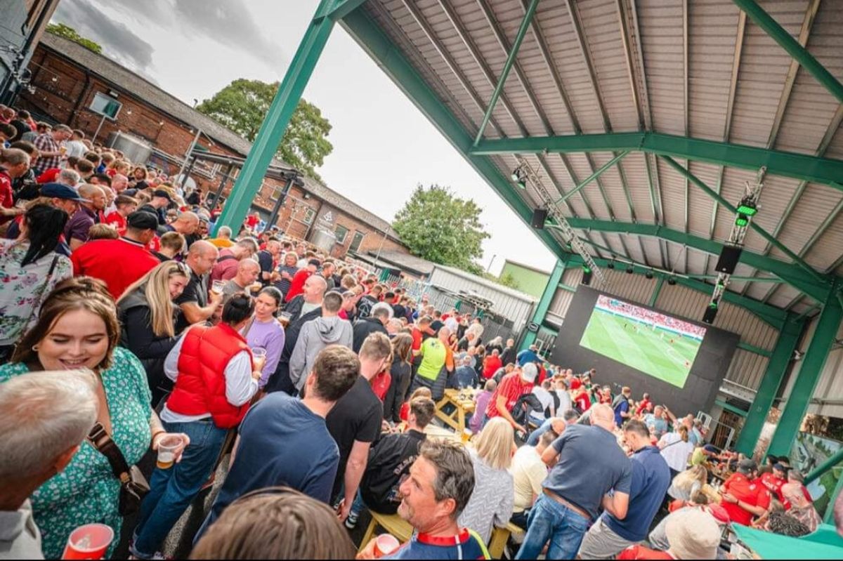Outdoor event at The Big Shed, Ye Olde Trip to Jerusalem, for a lively sports viewing party.