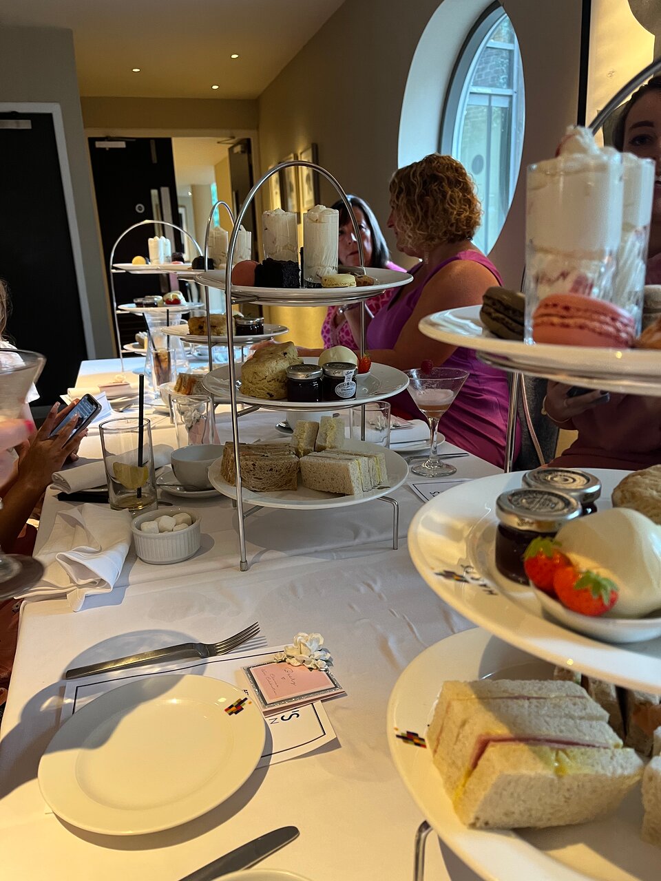 Elegant afternoon tea at Hart's Kitchen with delicious scones and networking ambiance.