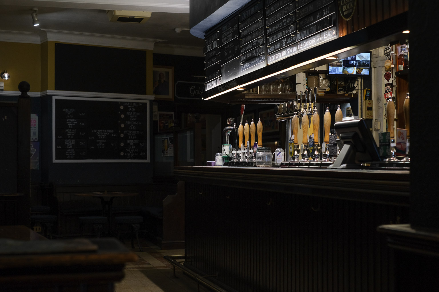 The Old Cold Store bar with polished taps, perfect for networking events and gatherings.
