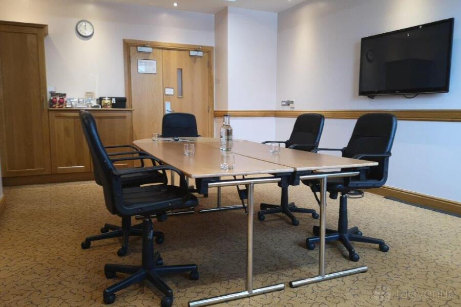 Private meeting room at Hart's Hotel & Kitchen, equipped for workshops and presentations.