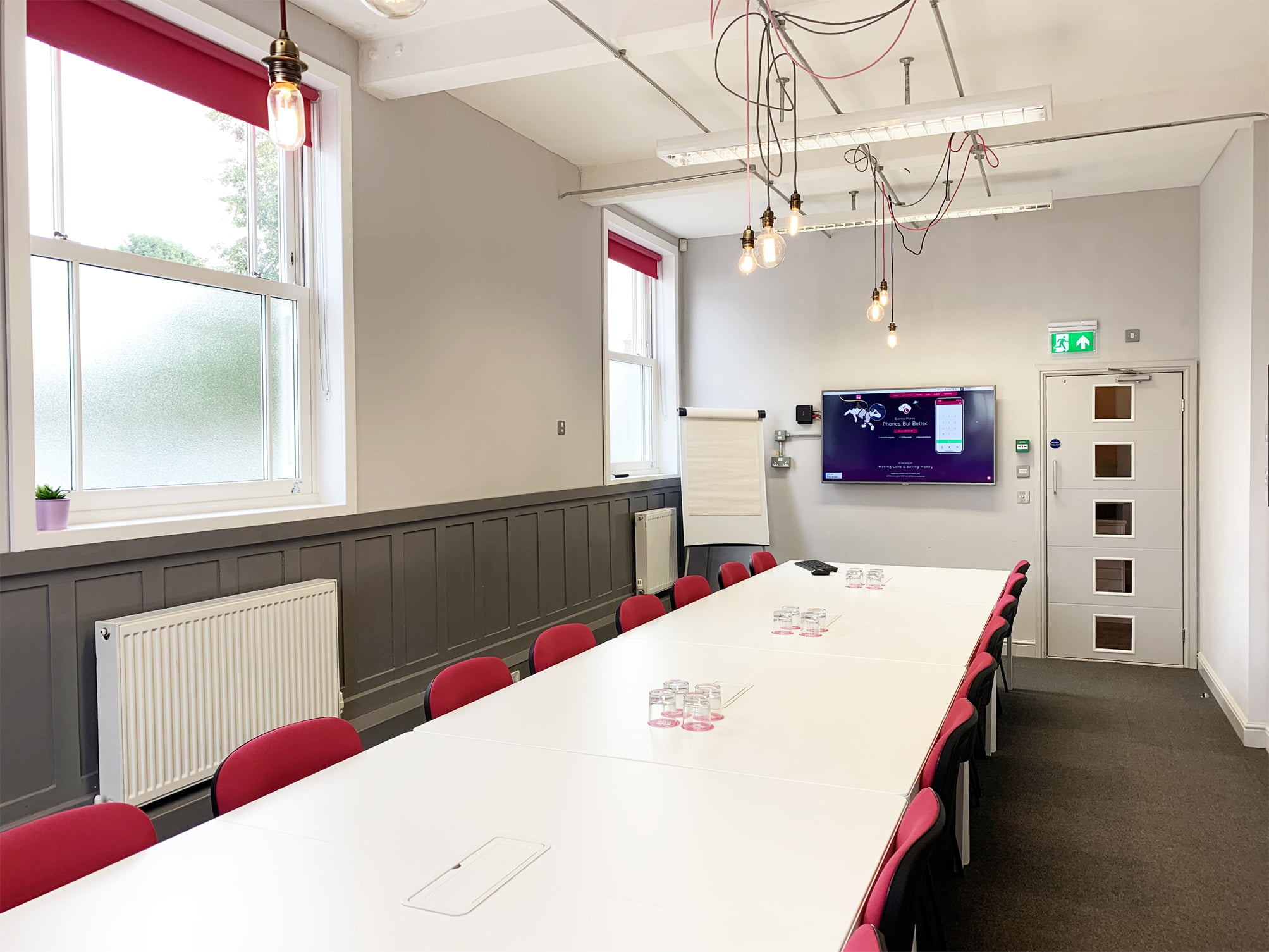 Modern meeting room at The Vat & Fiddle, ideal for presentations and workshops.