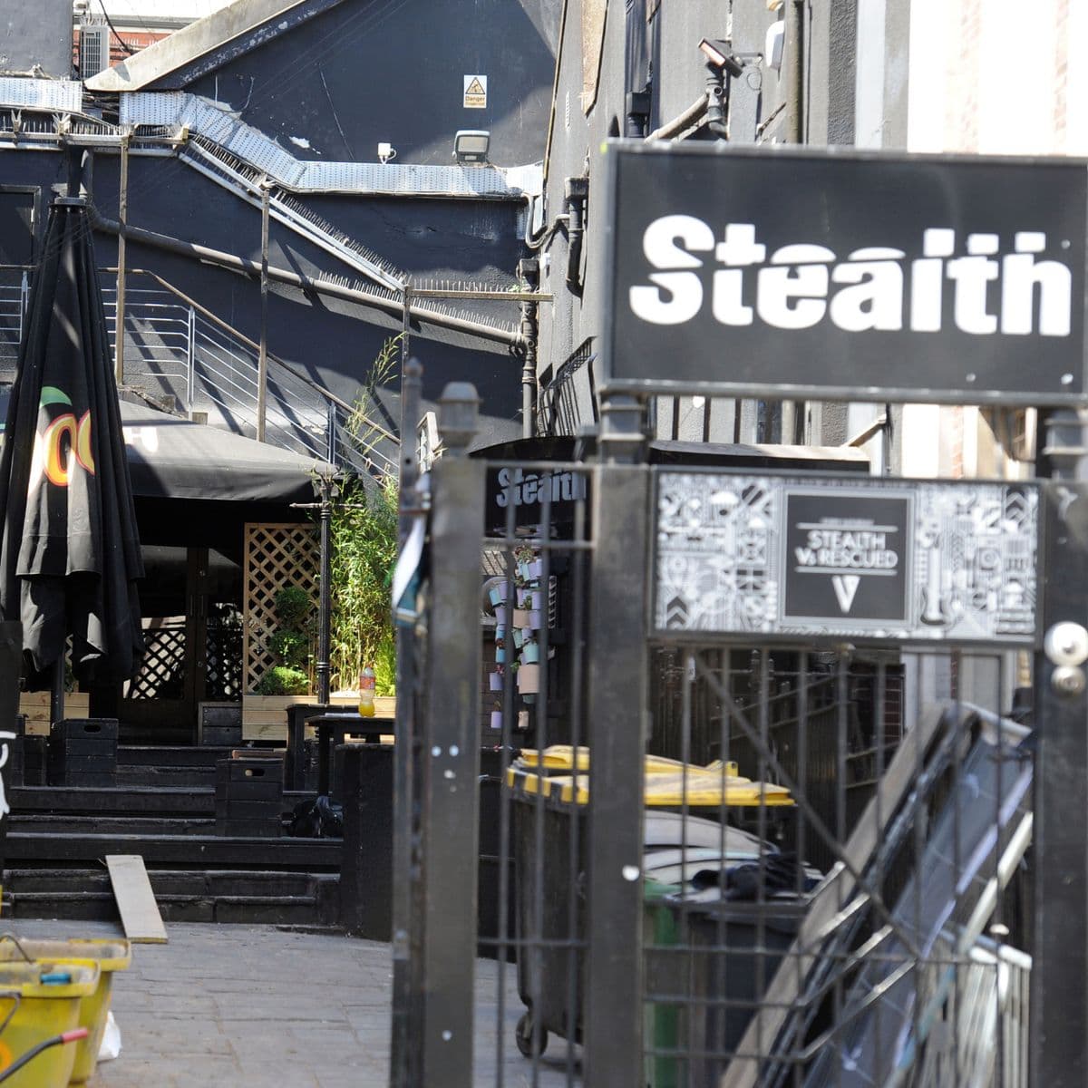 Urban venue entrance with industrial decor for creative events and gatherings.