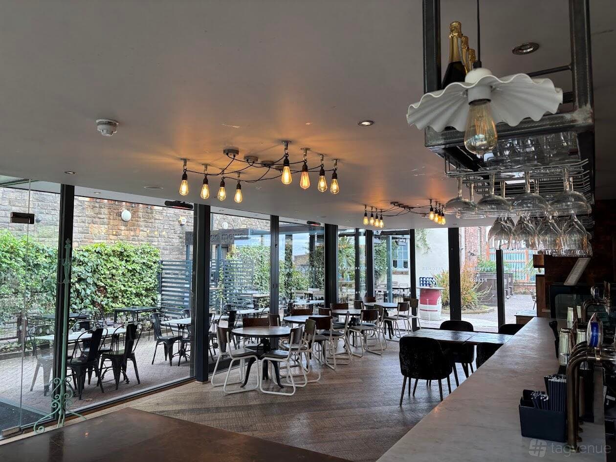 Terrace Bar at Pitcher & Piano: bright event space for gatherings and meetings.