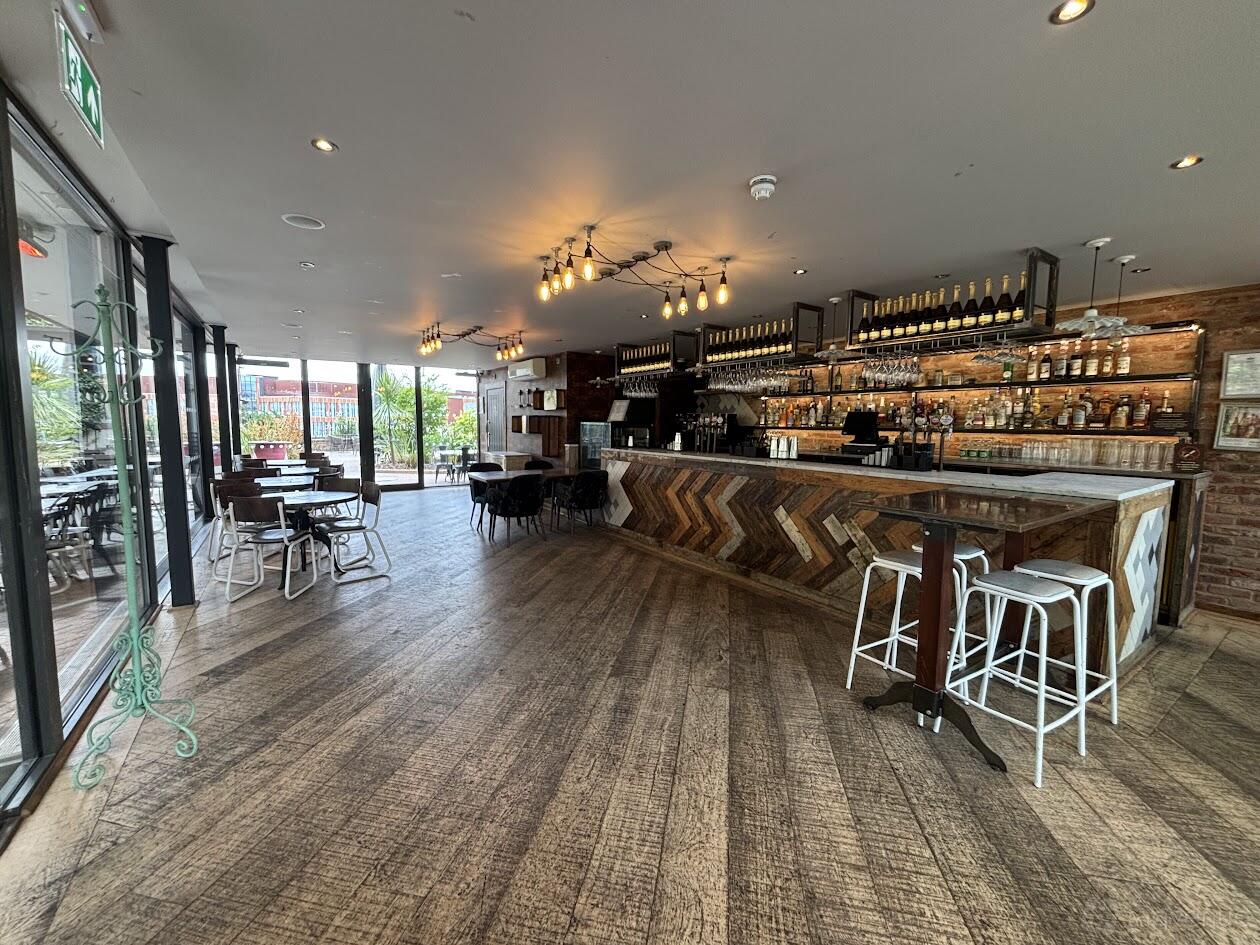 Stylish Terrace Bar at Pitcher & Piano, ideal for gatherings and networking events.