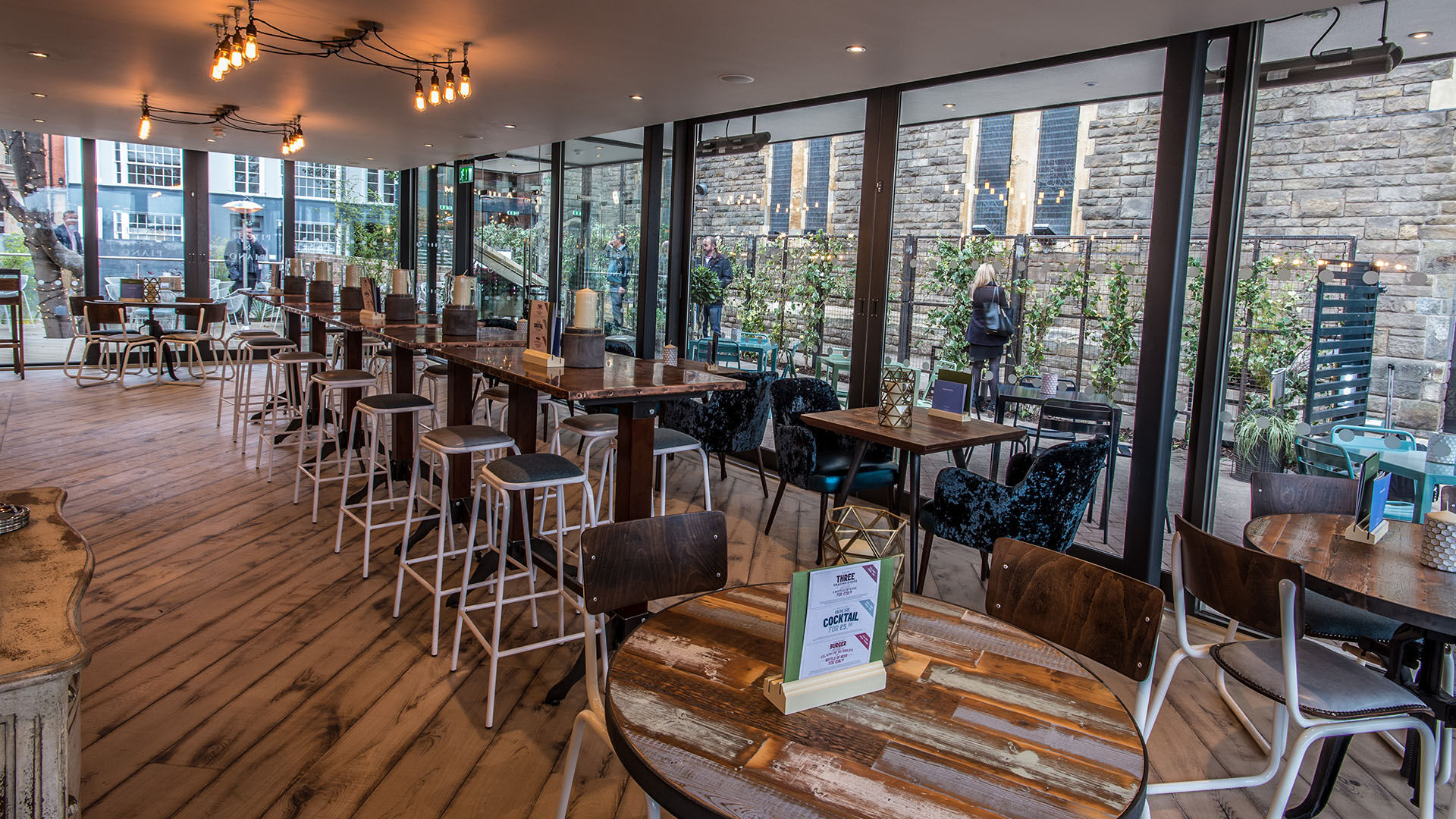 Terrace Bar at Pitcher & Piano: Modern event space with natural light for gatherings.