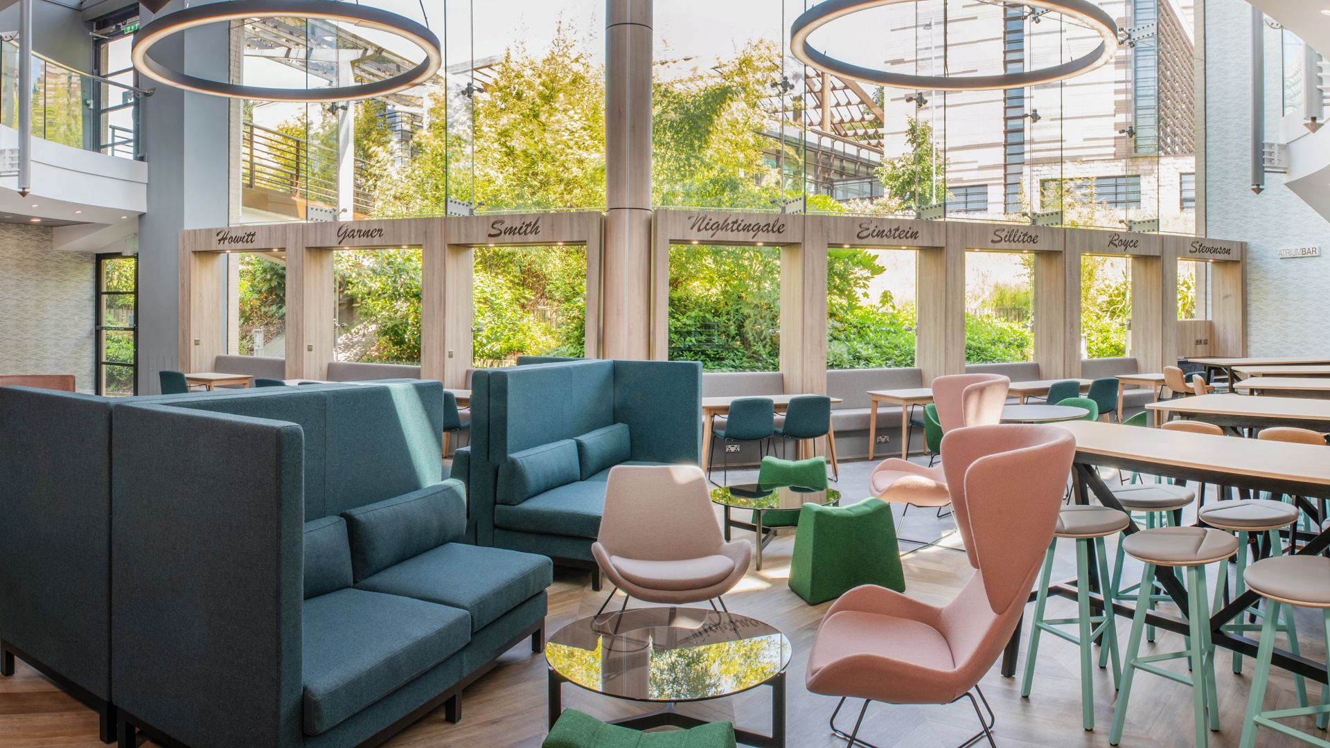 Modern meeting room with natural light, perfect for networking events and informal meetings.