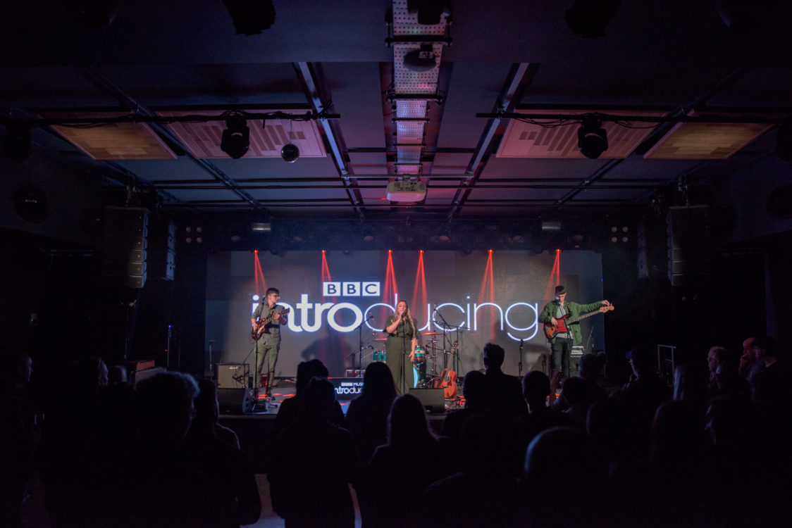 Live performance on Metronome Main Stage with vibrant lighting for events.