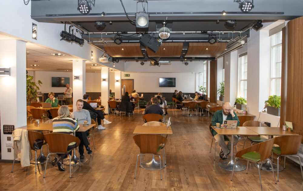 Versatile Metronome Bar & Atrium event space with natural light for workshops and networking.