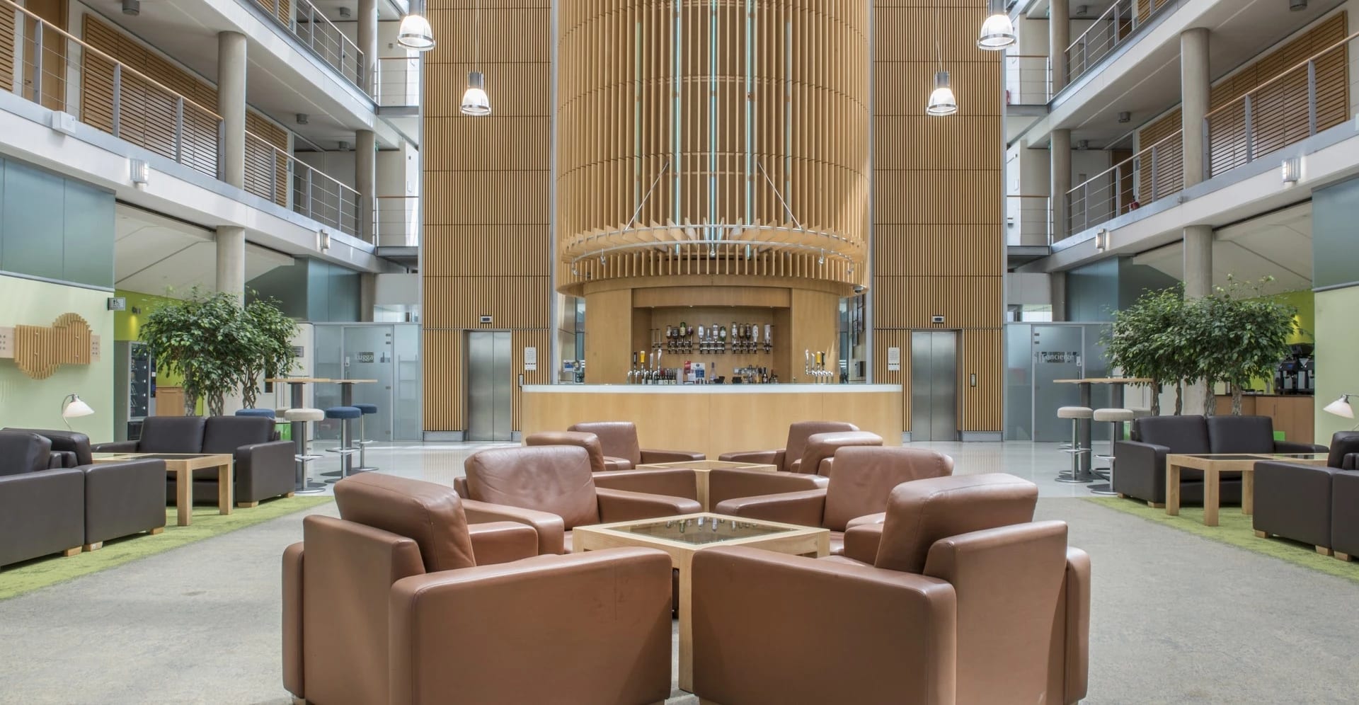 Modern Bar & Atrium lobby with stylish seating for networking events and conferences.