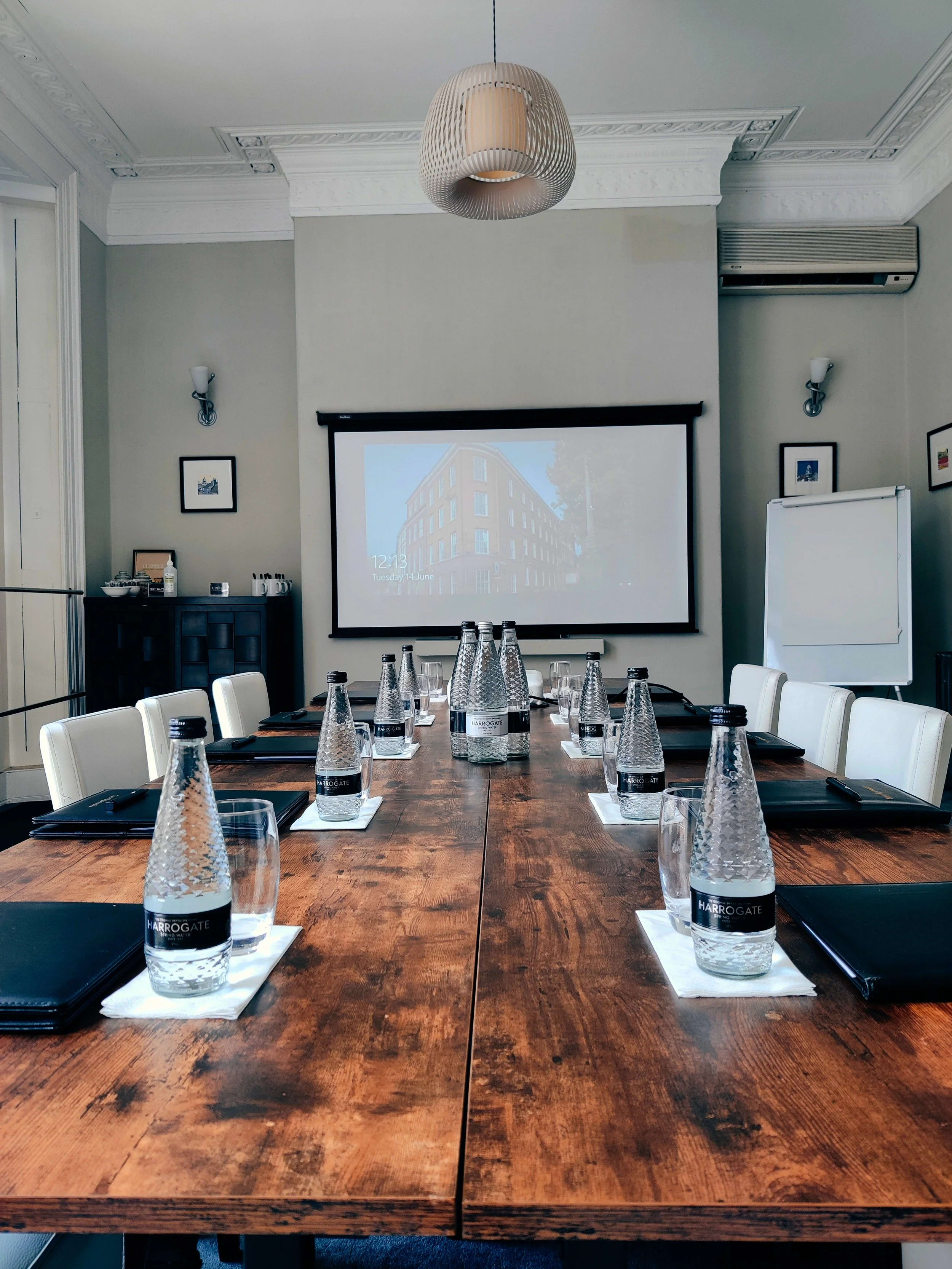 Flocc Room at Lace Market Hotel: stylish meeting space with long table for collaboration.